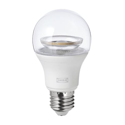 Ikea TRÅDFRI smart light bulb, white, round shape with clear glass top, made of polycarbonate plastic.