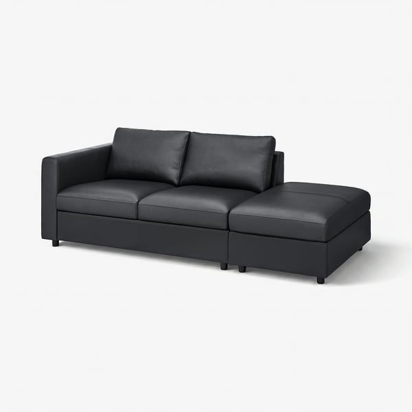Black leather modern sofa with a storage footrest.