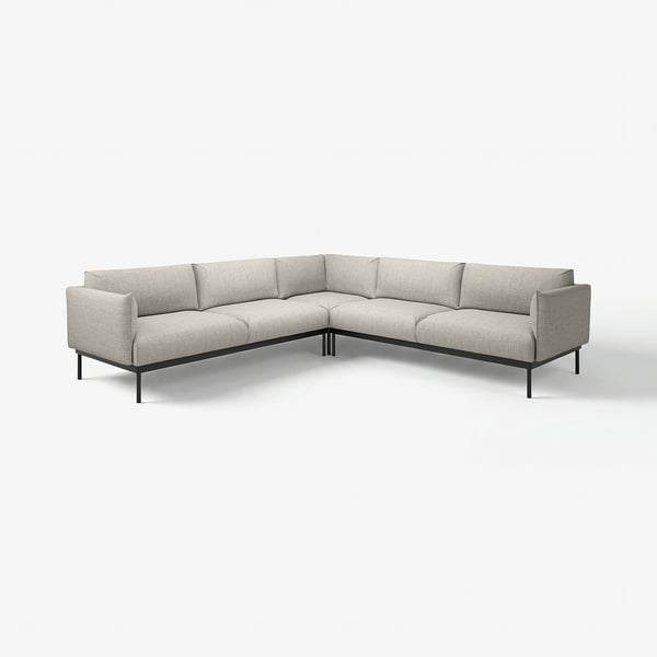 Modernes graues, l-förmiges Sofa mit schlanken schwarzen Beinen und klaren Linien.