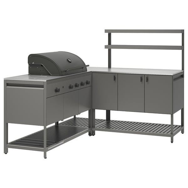 Modernes Außenküchenset. Dazu gehören graue Metallschränke, Arbeitsplatte und Gasgrill. Elegantes Design mit Stauraum.