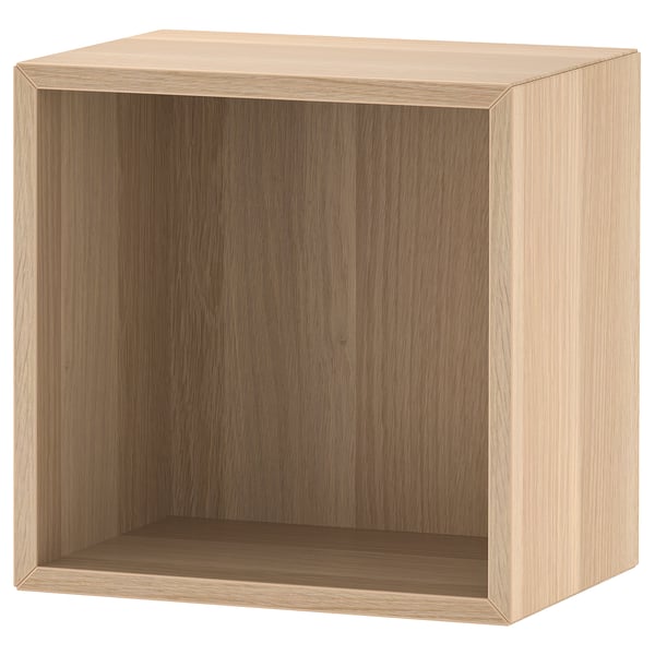 Ein ikea EKET Würfelregal. Er ist hellbraun, quadratisch und aus Spanplatten mit schlichtem Design.