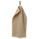 Beige GULVIAL Baumwollhandtuch hängend. Weich, Frottee-Textur, rechteckige Form, schlichtes Design.