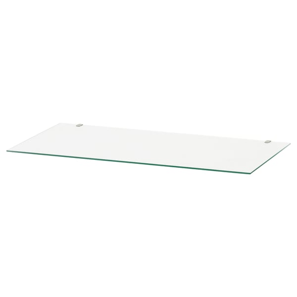 Ein Regal aus klarem Glas, ideal für HEMNES-Möbel, das Schutz und ein sauberes Aussehen bietet.