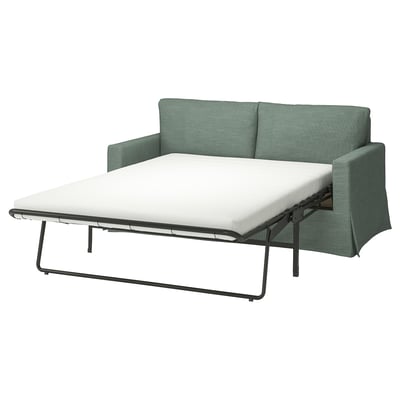 Blaugrünes Schlafsofa, umwandelbar; Moderner, schlanker Metallrahmen und bequeme Kissen.