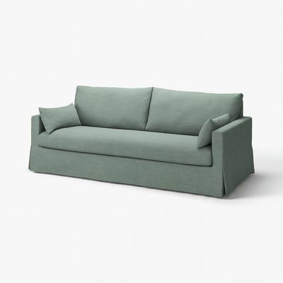 Ein grünes HYLTARP-Sofa, gefertigt aus langlebiger Baumwolle und recyceltem Polyesterstoff, mit einem strukturierten, ton-in-ton-artigen Design.