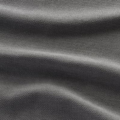 Nahaufnahme eines weichen, glänzenden Stoffes mit feinen, reflektierenden Fäden, der seine strapazierfähige und luxuriöse Textur zur Geltung bringt.