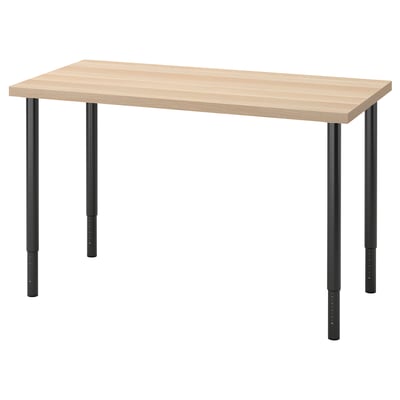 Zeigt einen LAGKAPTEN-Tisch mit einer hellbeigen Platte und schwarzen, verstellbaren Metallbeinen.