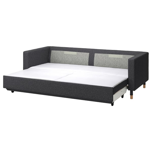 Modernes Schlafsofa, grauer Stoff, Holzbeine, rechteckige Form, wandelbares Design.