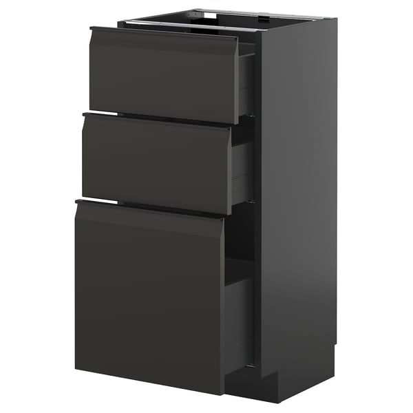 Moderner schwarzer Küchenschrank mit drei ausziehbaren Schubladen.