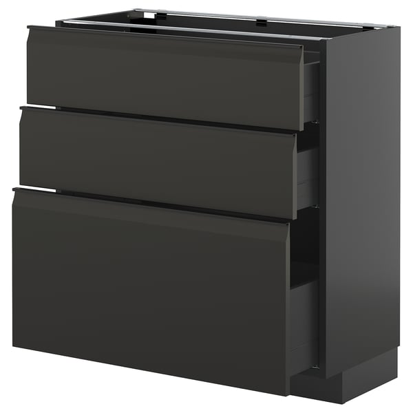 Moderner schwarzer IKEA METOD Küchenschrank mit drei integrierten Griffschubladen.