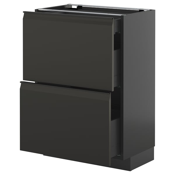 Schwarze moderne Küchenzeile, zwei große Schubladen, schlankes Design ohne Griff, glänzende Oberfläche.