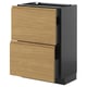 Moderner Küchenschrank, schwarz und Holz, zwei Schubladen, schlanke Griffe.
