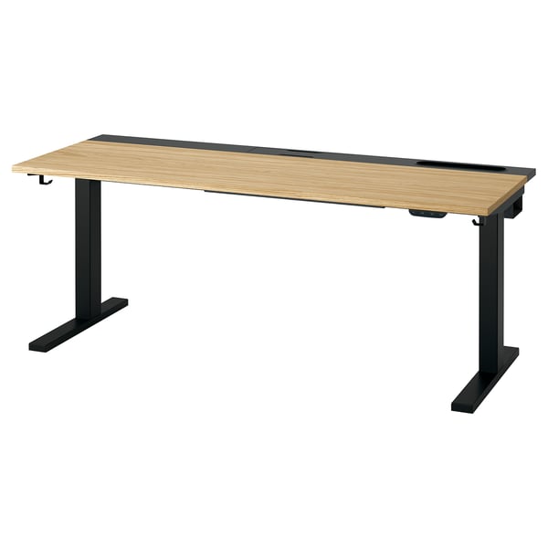 Sitz-Steh-Schreibtisch MITTZON: modern, schwarzes Untergestell, Holzplatte. Ergonomisches Design mit zwei Motoren und Kabelmanagement.