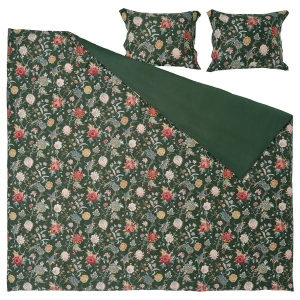 Ein dunkelgrünes Bettwäsche-Set von NÄSSELKLOCKA mit Blumenmustern aus einer Baumwoll-Viskose-Mischung.