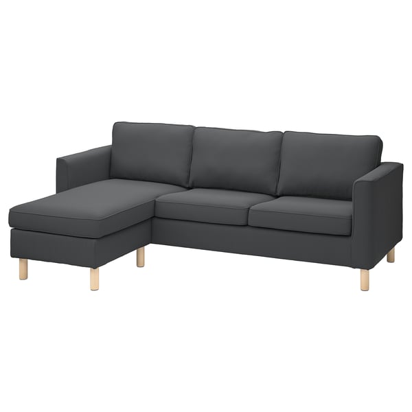 Ein graues PÄRUP-Ecksofa mit breitem Cordbezug, das sich in modernem Design mit Holzbeinen zeigt.