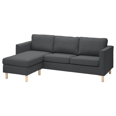 Ein graues PÄRUP-Ecksofa mit breitem Cordbezug, das sich in modernem Design mit Holzbeinen zeigt.