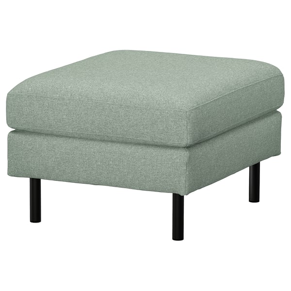Hellgrüner Fußschemel mit schlanken Metallbeinen. Modernes, minimalistisches Design, perfekt für zusätzliche Sitzgelegenheiten.