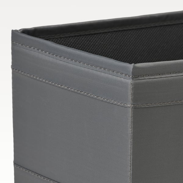 Aufbewahrungsbox aus grauem Stoff mit robusten Nähten und Netzoberseite.
