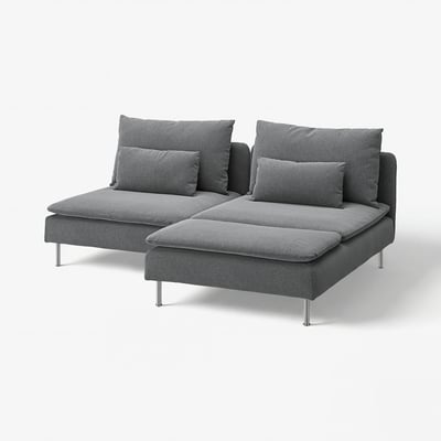 Ein graues SÖDERHAMN-Ecksofa mit modernem, flachem Design. Es hat tiefe Polster und eine Chaiselongue, die von schlanken Metallbeinen getragen wird.