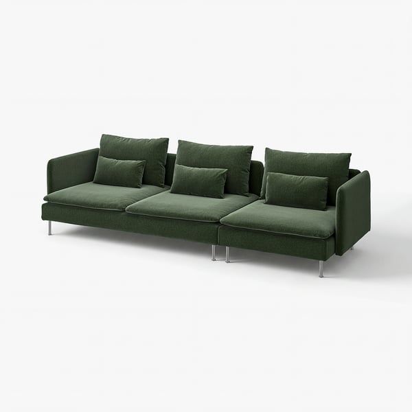 Ein grünes SÖDERHAMN-Ecksofa mit tiefen Sitzen, lockeren Kissen und hohen Beinen, das ein komfortables und modernes Design bietet.