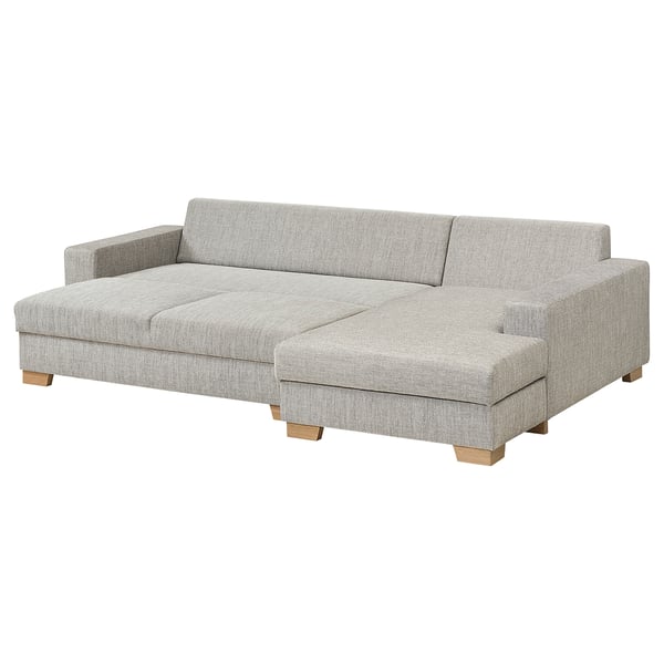 Ein modernes graues SÖRVALLEN-Sofa mit Chaiselongue in minimalistischem skandinavischem Design mit Holzbeinen.