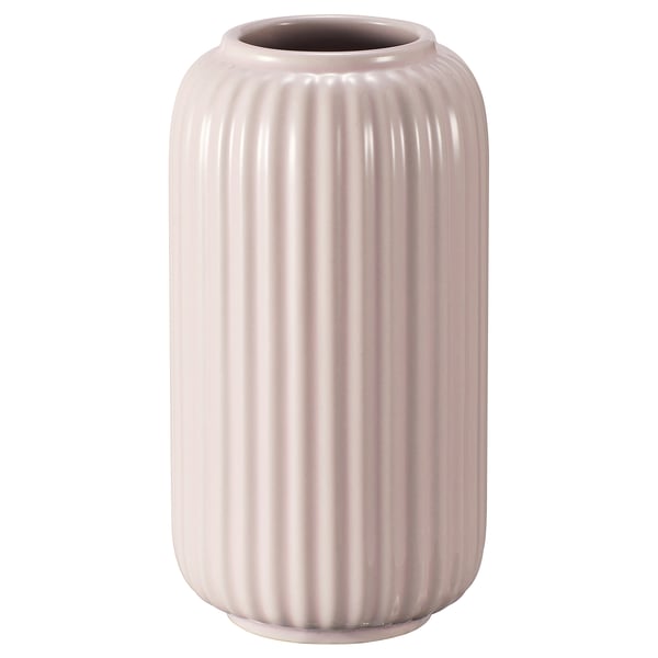 Eine hellrosafarbene, zylindrische Vase STILREN mit vertikalen Rillen und einem glatten Inneren, hergestellt aus Feinsteinzeug mit farbiger Glasur.