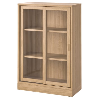 TONSTAD Schrank aus heller Eiche mit Glasschiebetüren, rechteckige Form, vier Regale, modernes Design.