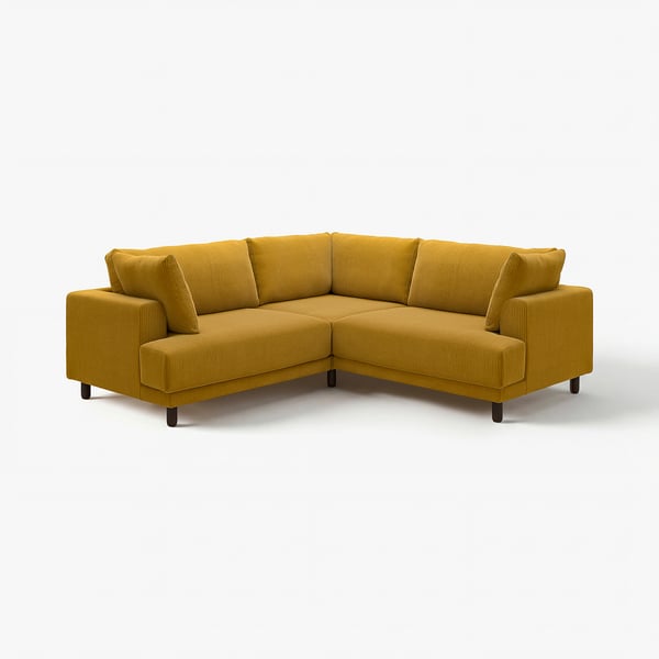 Ein leuchtend gelbes UPPÅKRA-Ecksofa mit tiefen Kissen, modernes und einladendes Design.