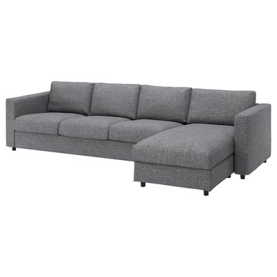 Ein graues Sektionssofa VIMLE mit einer Chaiselongue auf der rechten Seite. Er ist modern, komfortabel und bietet vielseitige Sitzgelegenheiten.