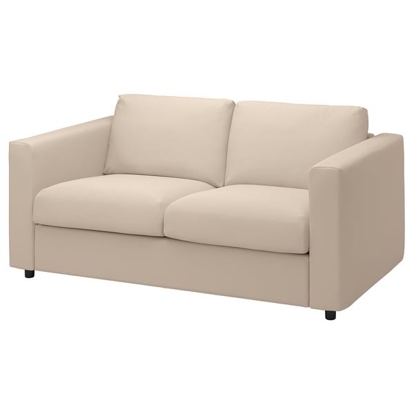 Ein beiges VIMLE-Sofa mit einem schlanken, modernen Design und weichem, strapazierfähigem Stoff.