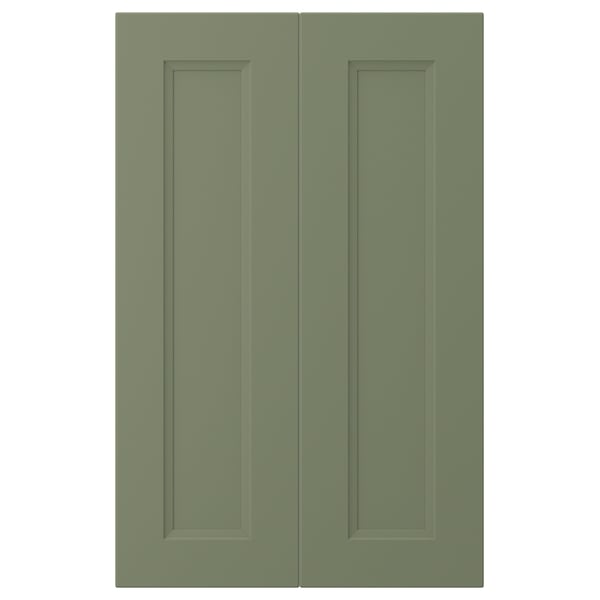 Two green cabinet doors side-by-side in gray-green with inset panels and smooth surfaces.