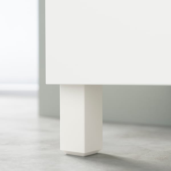 Minimalist white BESTÅ tv bench leg, sleek and modern.