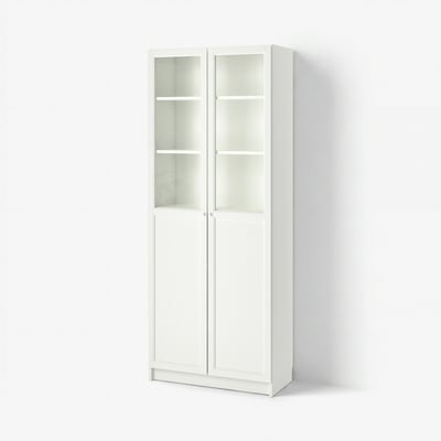 A white BILLY bookcase with glass doors. It stands tall, rectangular, with four shelves inside. The design is simple and modern, ideal for storage.