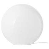 A white FADO table lamp. It has a sphere shape made of glass and stands on a plastic base. Its simple and modern designed to emit soft light.