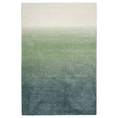 Ombre rug: hotelrum, gradient blue-green-white, soft, rectangular.