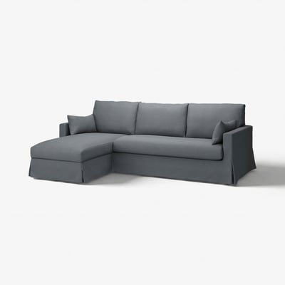 Grey l-shaped sofa, HYLTARP model, with clean lines and storage chaise longue.