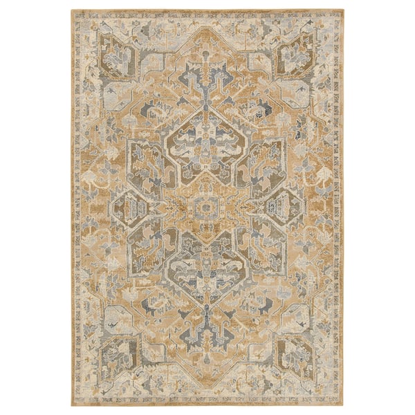 A beige JÄRNVÄG rug with intricate designs, made from recycled materials.