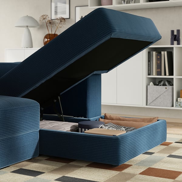 Blue modular sofa with storage. Opens to show cushions and access.