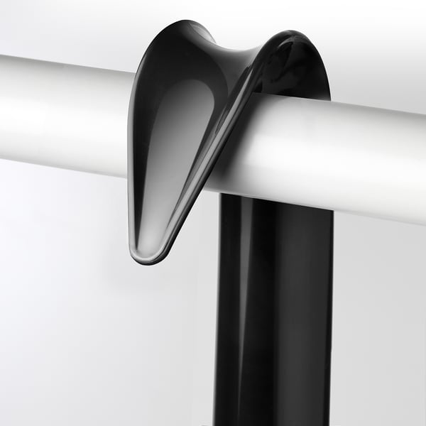 Shoehorn with durable, rounded plastic handle, designed for easy grip and hanging.