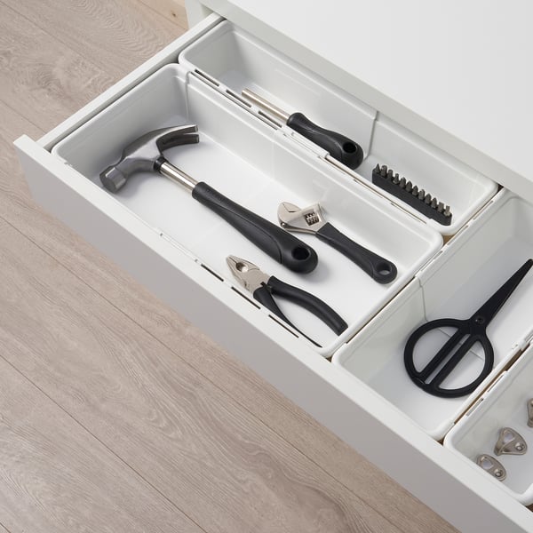 Open drawer showing tools: hammer, pliers, wrench, scissors, screwdriver set.
