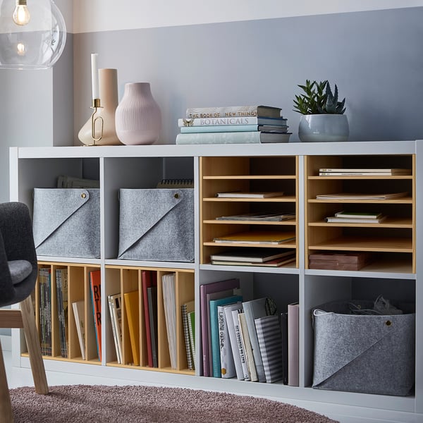Bookshelf: KALLAX. White, pinewood, rectangular. Holds books, boxes & decor. Tall, large, organised.