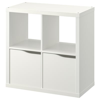 White KALLAX shelving unit with open and drawer compartments, wall-mountable.