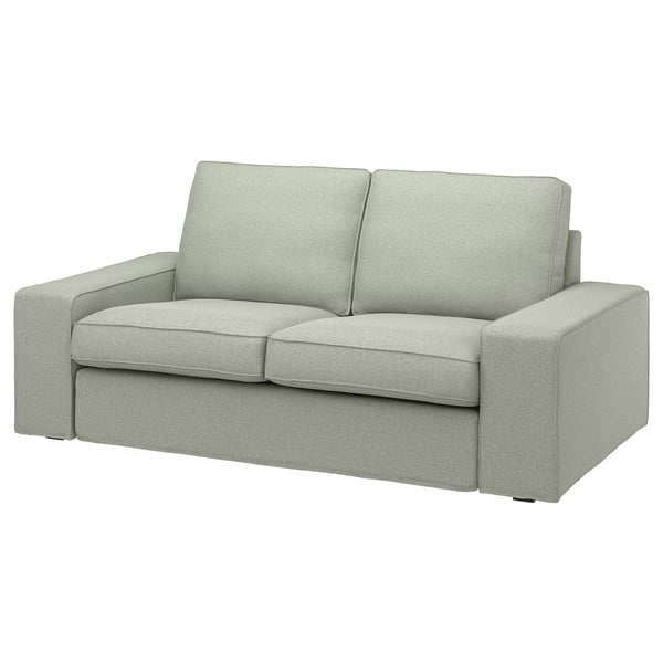 KIVIK sofa: compact, grey, plush. Angled design with low armrests.