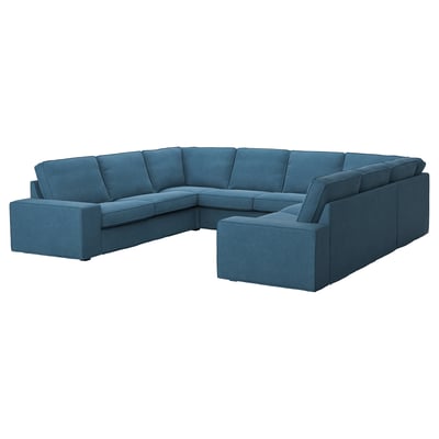 Blue KIVIK sectional sofa, curved, comfortable for multiple.