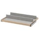A KOMPLEMENT shoe tray, light grey in colour, made of fiberboard and plastic, with a pull-out design for easy access.