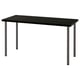 Depicts an IKEA LAGKAPTEN table, black with metal legs. Minimalist and modern design.