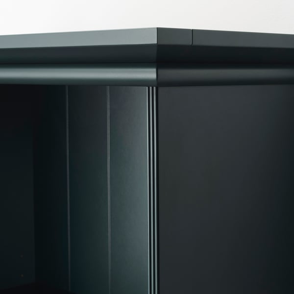 Modern black storage unit with sleek design and smooth finish. Shows sturdy corners and clean edges.