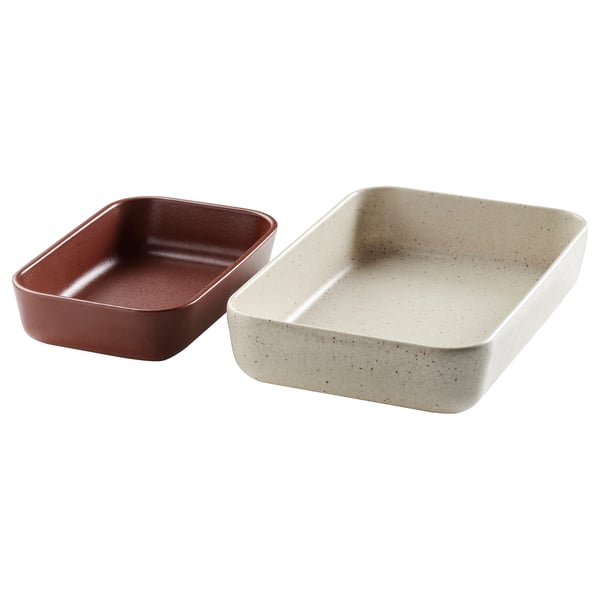 Two ceramic oven dishes in red and light grey, rectangular shape, simple design, suitable for serving and baking.