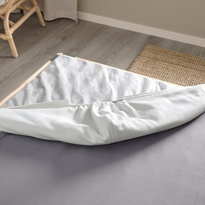A flat-pack mattress base with a removable, washable cover. It includes a bonnell spring core for motion dampening and airflow.