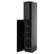 Black kitchen cabinet, tall. Modern design with open door, shelves visible.